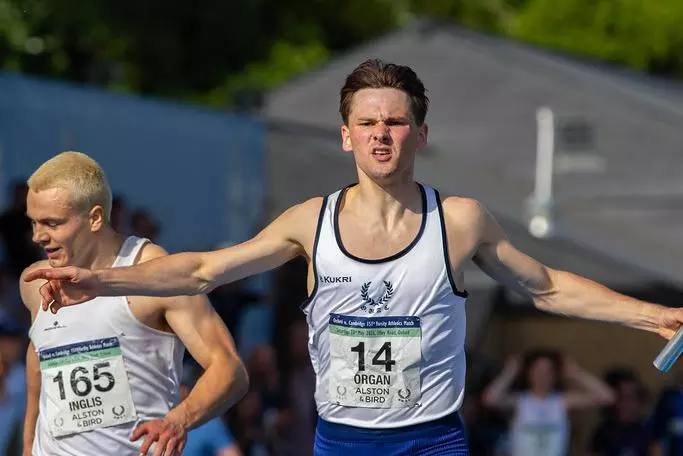 Runner winning a race